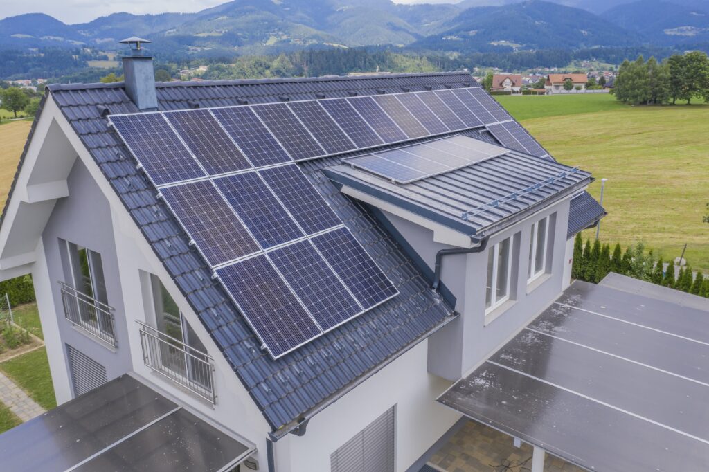 aerial view private house with solar panels roof